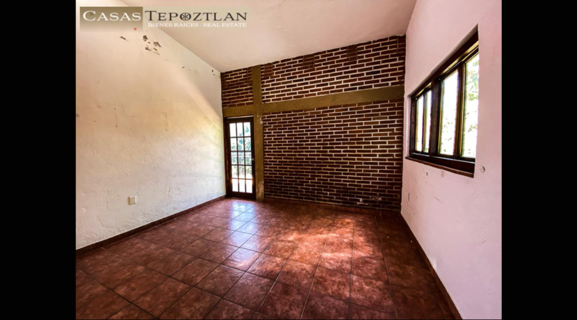 casa_ideal_para_familias_grandes_en_tepoztlan_gran_jardin_alberca_terraza_asador_captacion_pluvial_pared