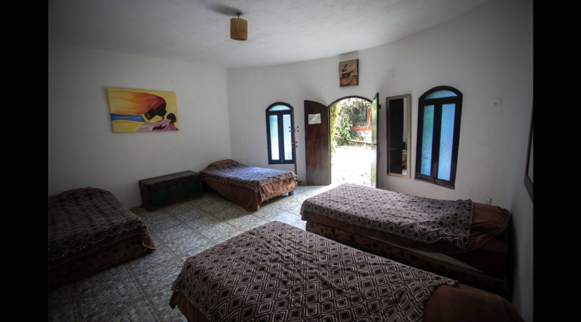 propiedad_a_la_venta_tepoztlan_ideal_para_hotel_taller_boutique_entorno_natural_terraza_enorme_vistas_panoramicas_jardín_enorme_camas